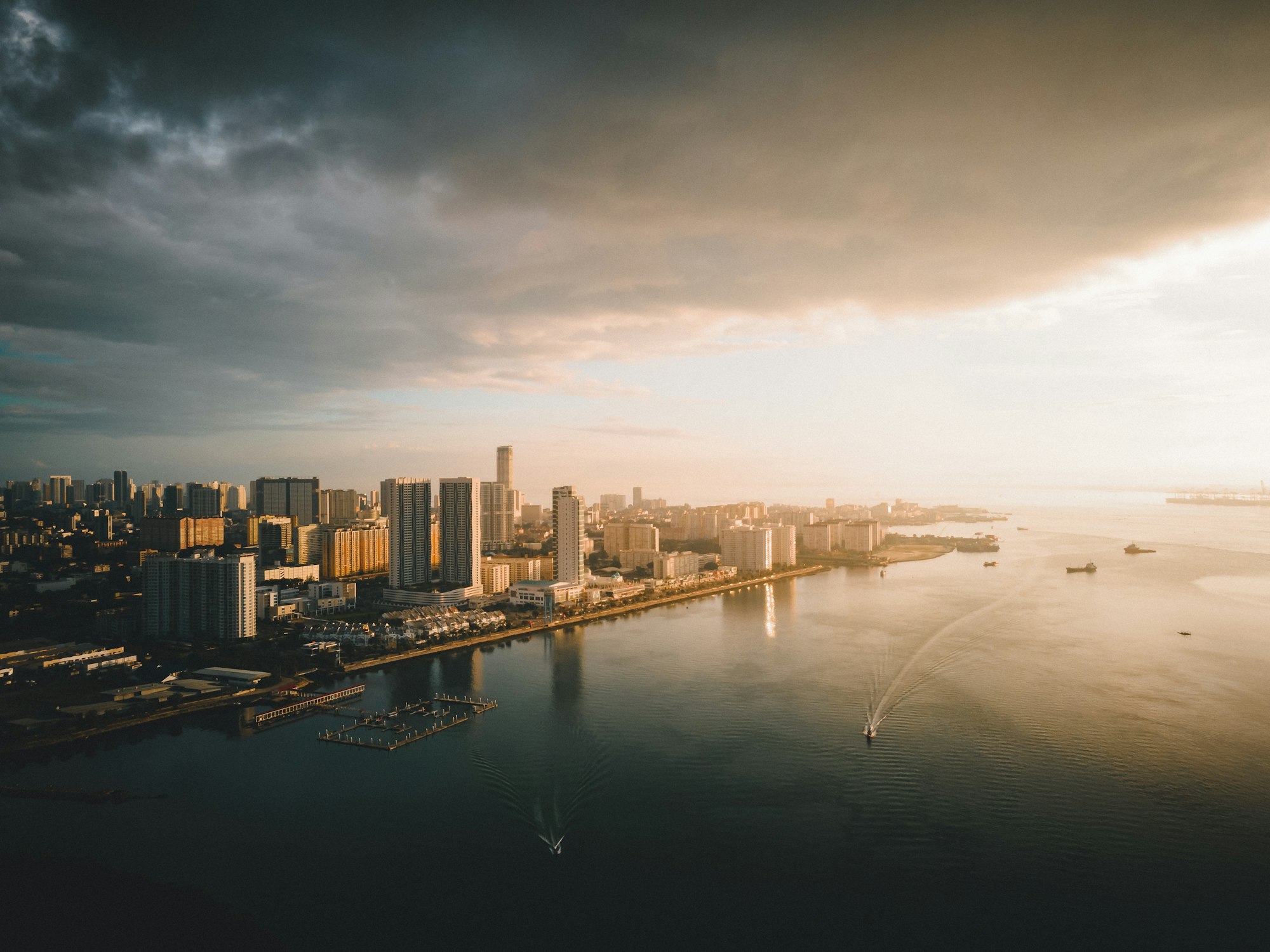 city skyline with sea view at sunrise. Karpal Singh Drive, Penang, Malaysia.